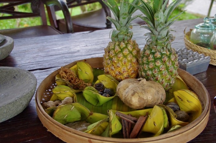 tray with pineapple and ginger often used as ingredients in a Balinese massage