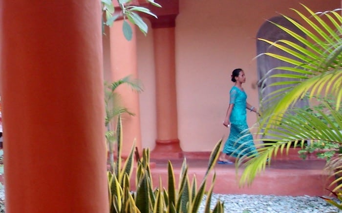 Balinese spa therapist walking at one of the spas