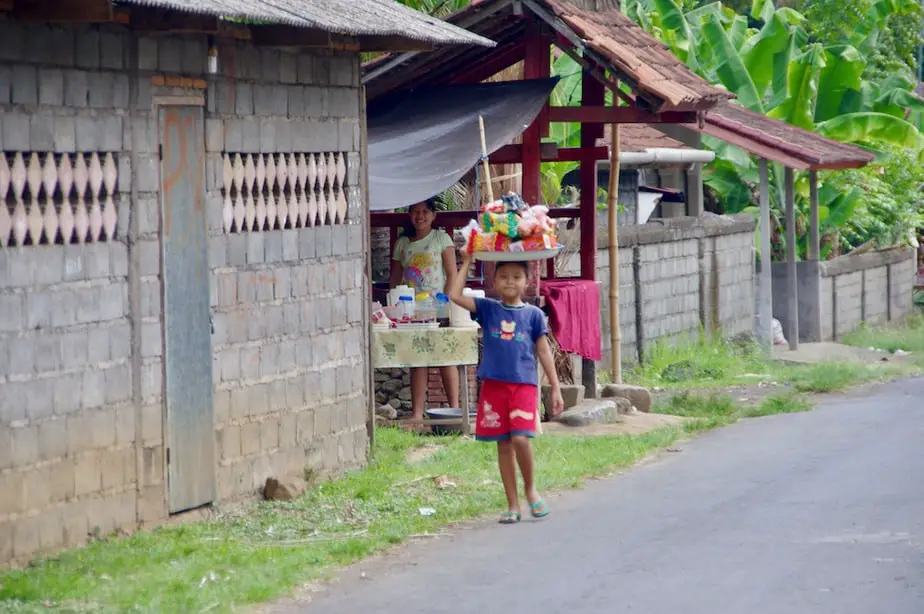 balinese girl selling snacks