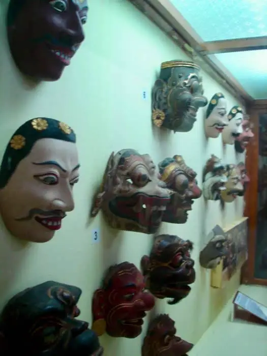 various Balinese topeng masks on display