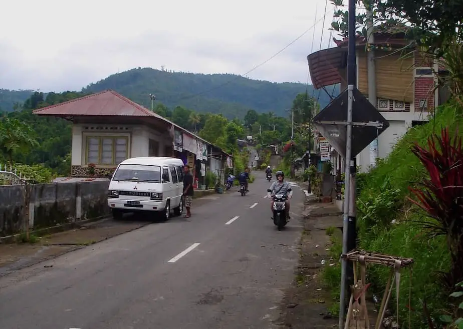 motor scooters driving through Munduk village