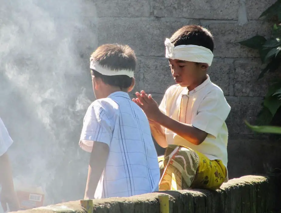 little boys in Munduk getting ready for a visit to the temple