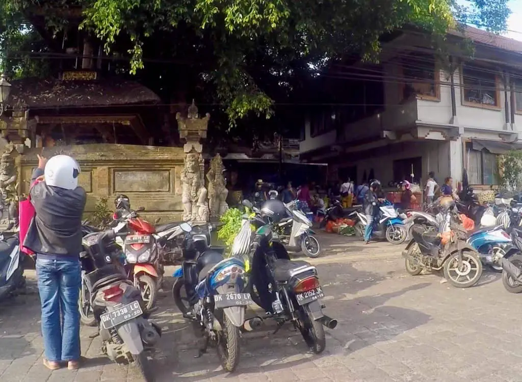motor bikes parked at the entrance of the Ubud market