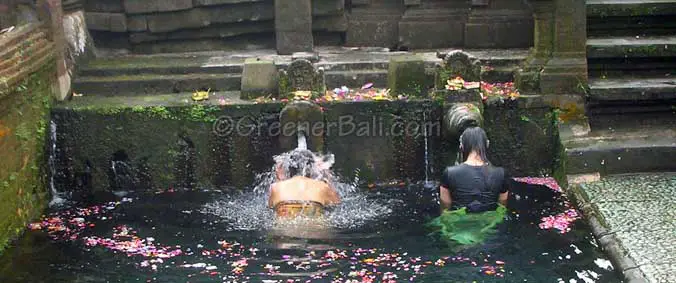 bathing in holy water at tirta empul
