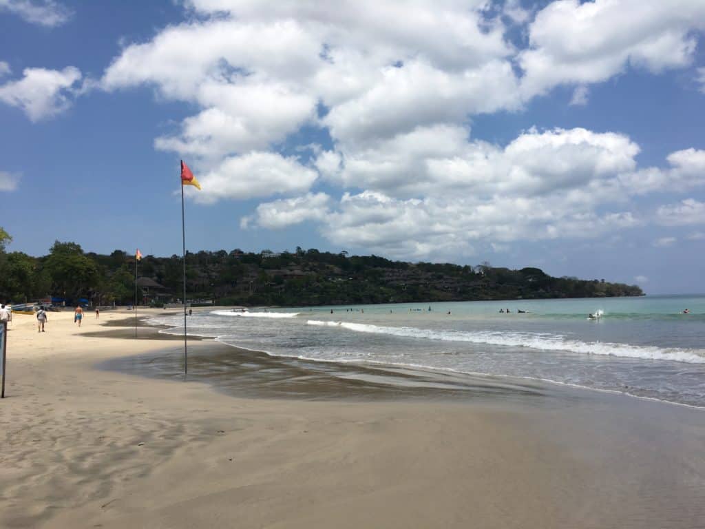 beginner surfers learning at jimbaran bay