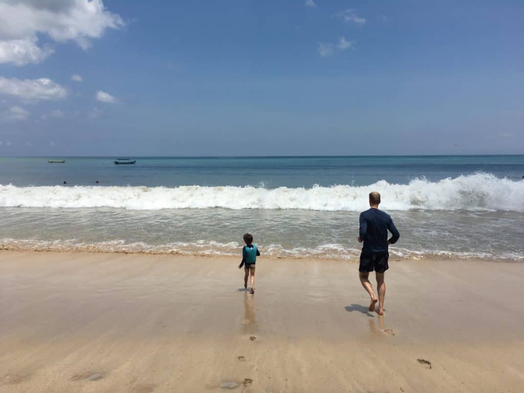 running in the water at Jimbaran Bay