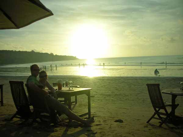 jimbaran beach seafood restaurant sunset