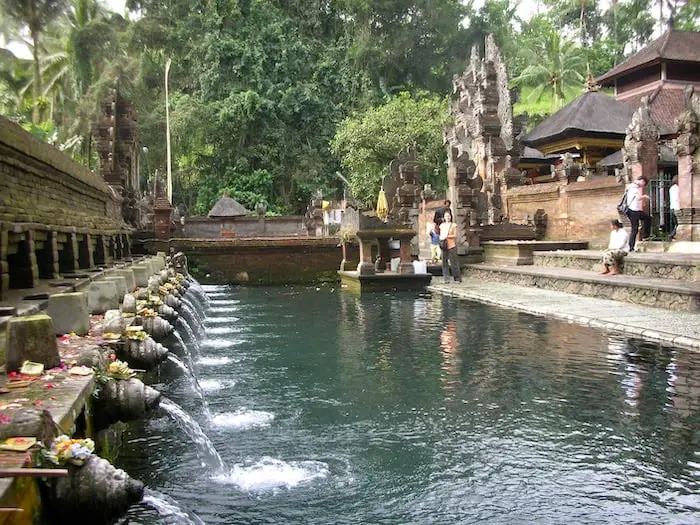 the famous bathing area at tirta empul temple in bali