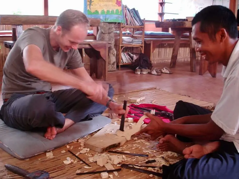 carving wood at the Pondok Pekok Library in Ubud