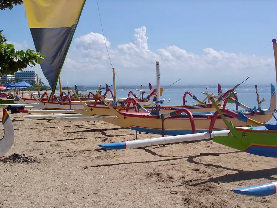 traditional fisherman boats for rent on the beach in Sanur