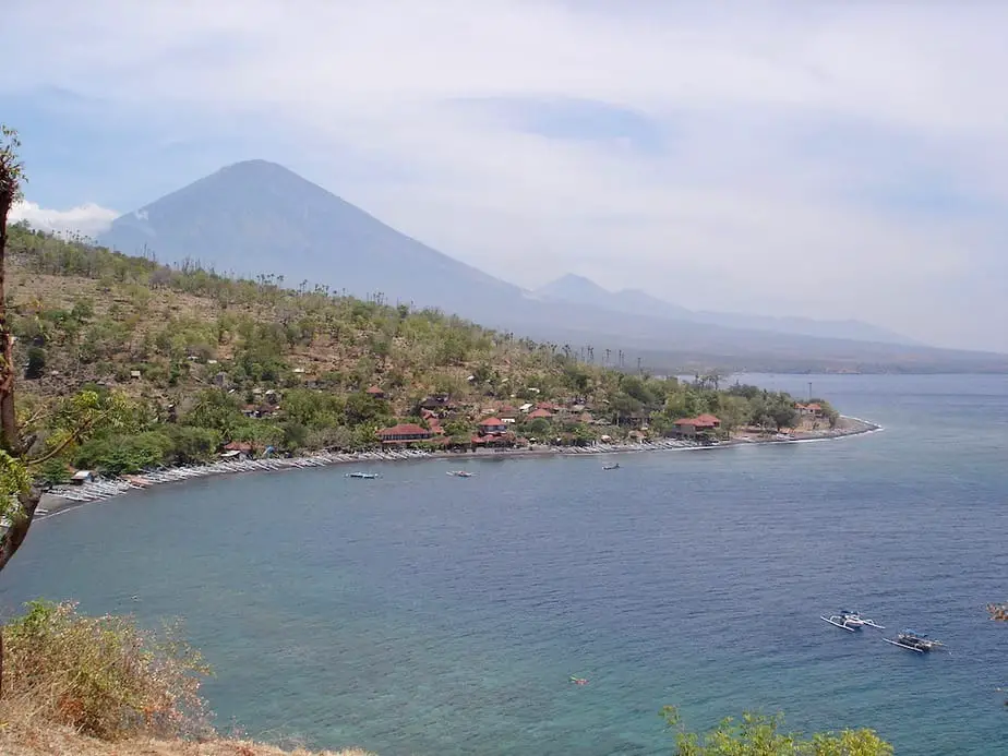 The bay at Amed Beach with fishing boats on the shore
