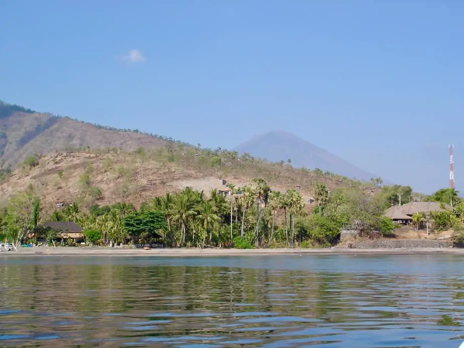 Amed Beach is one of the beaches in Bali with black volcanic sand and rocks