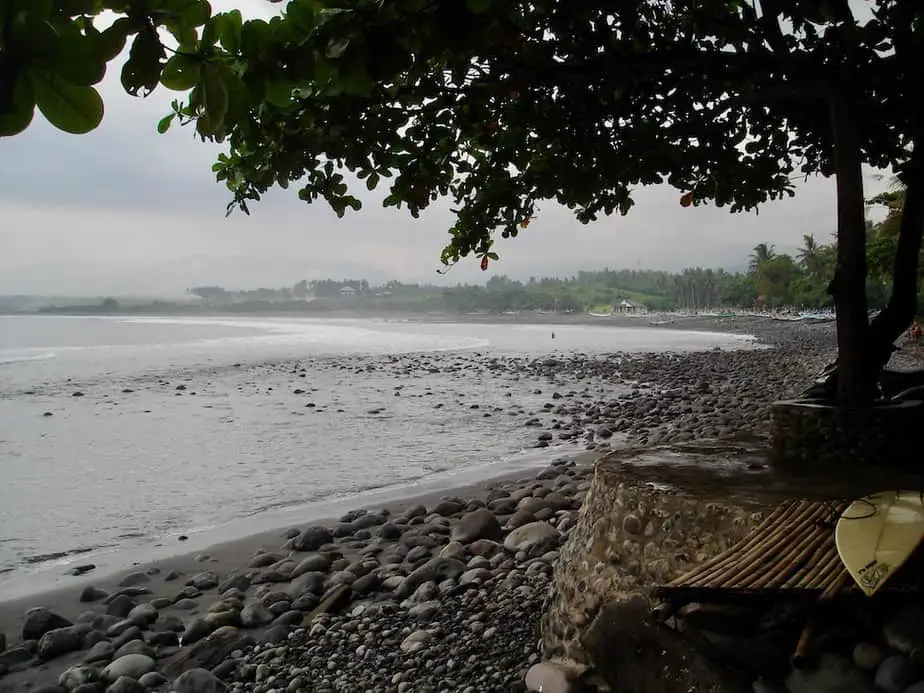 rocks and black volcanic sand at Medewi Beach in West Bali