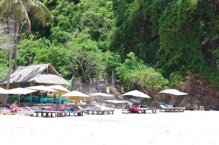 restaurant and sunloungers at Pasir Putih white sand beach bali