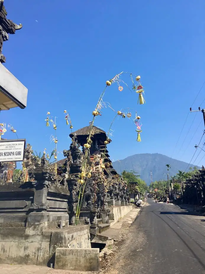 main road in Wongayagede with Mount Batukaru in the distance