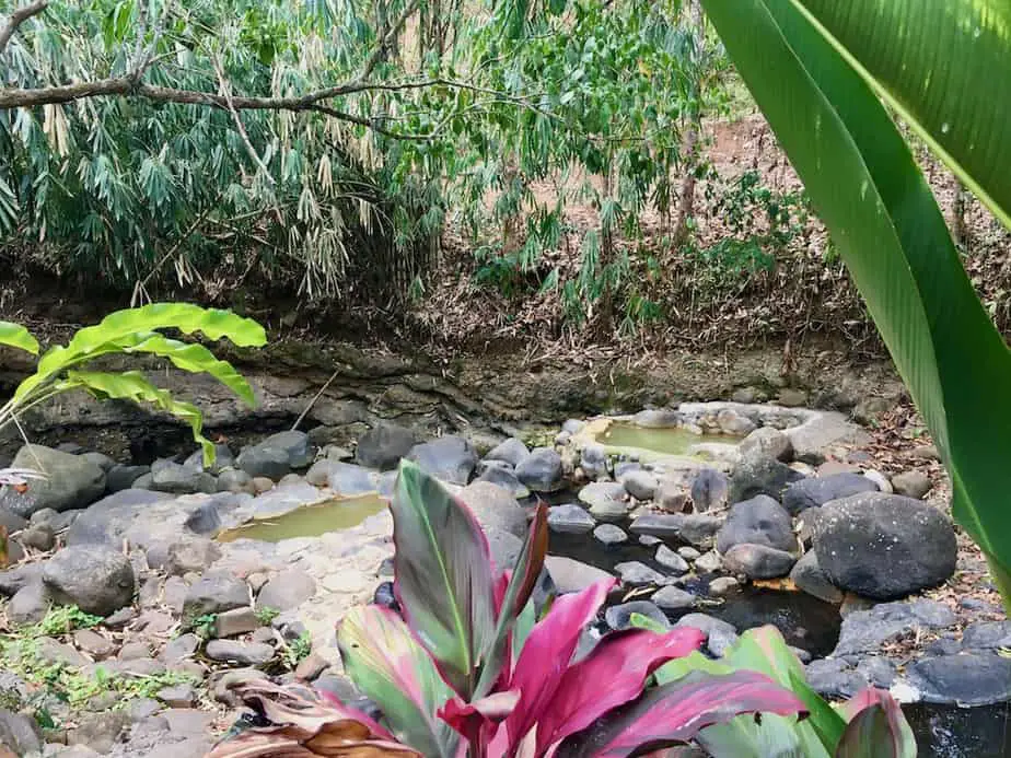 open-air natural hot springs near the river in Penatahan