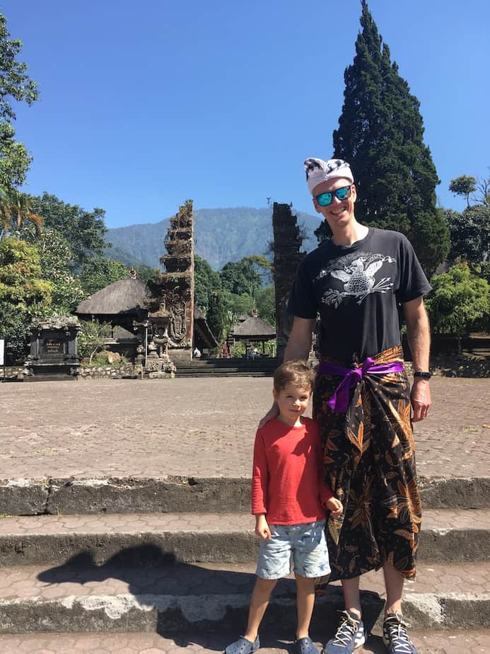 standing at the entrance of one of Bali's directional temples outside Wongayagede village