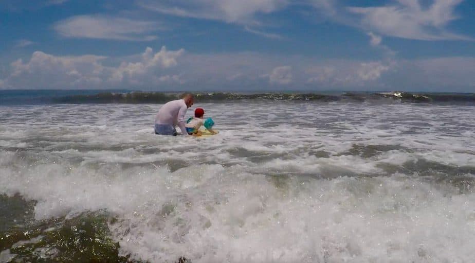 Using a body board on Canggu Beach