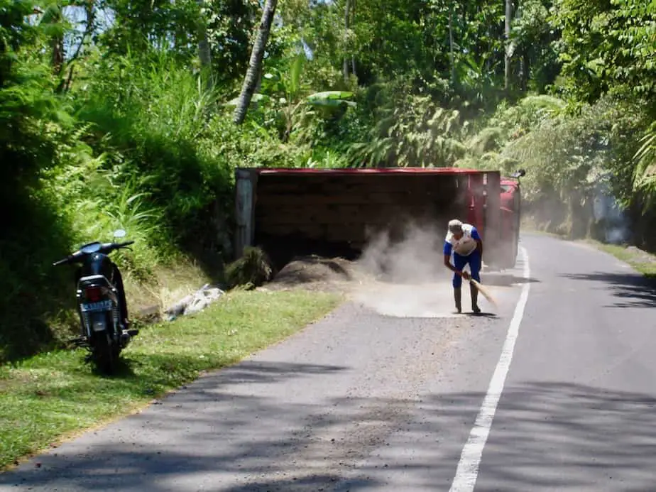 a truck has fallen on his side in Bali