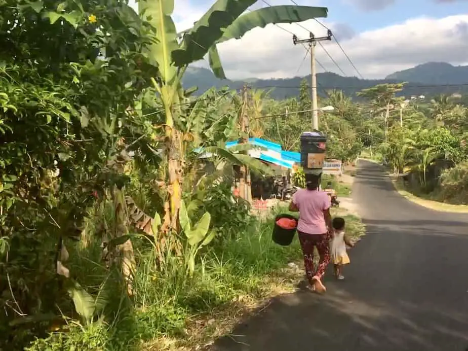 mother and daughter heading to the river to wash in Sidemen 